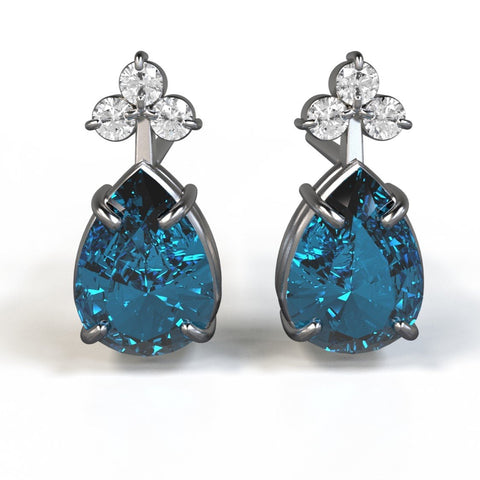 rossmore studs with pear cut blue topaz and round white diamonds in 14kt white gold