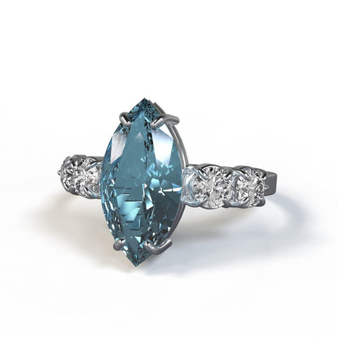 dover ring with aquamarine marquise cut center stone with white diamond accents in sterling silver