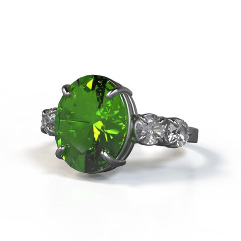 neponset ring with peridot center stone and white sapphire accent stones in sterling silver
